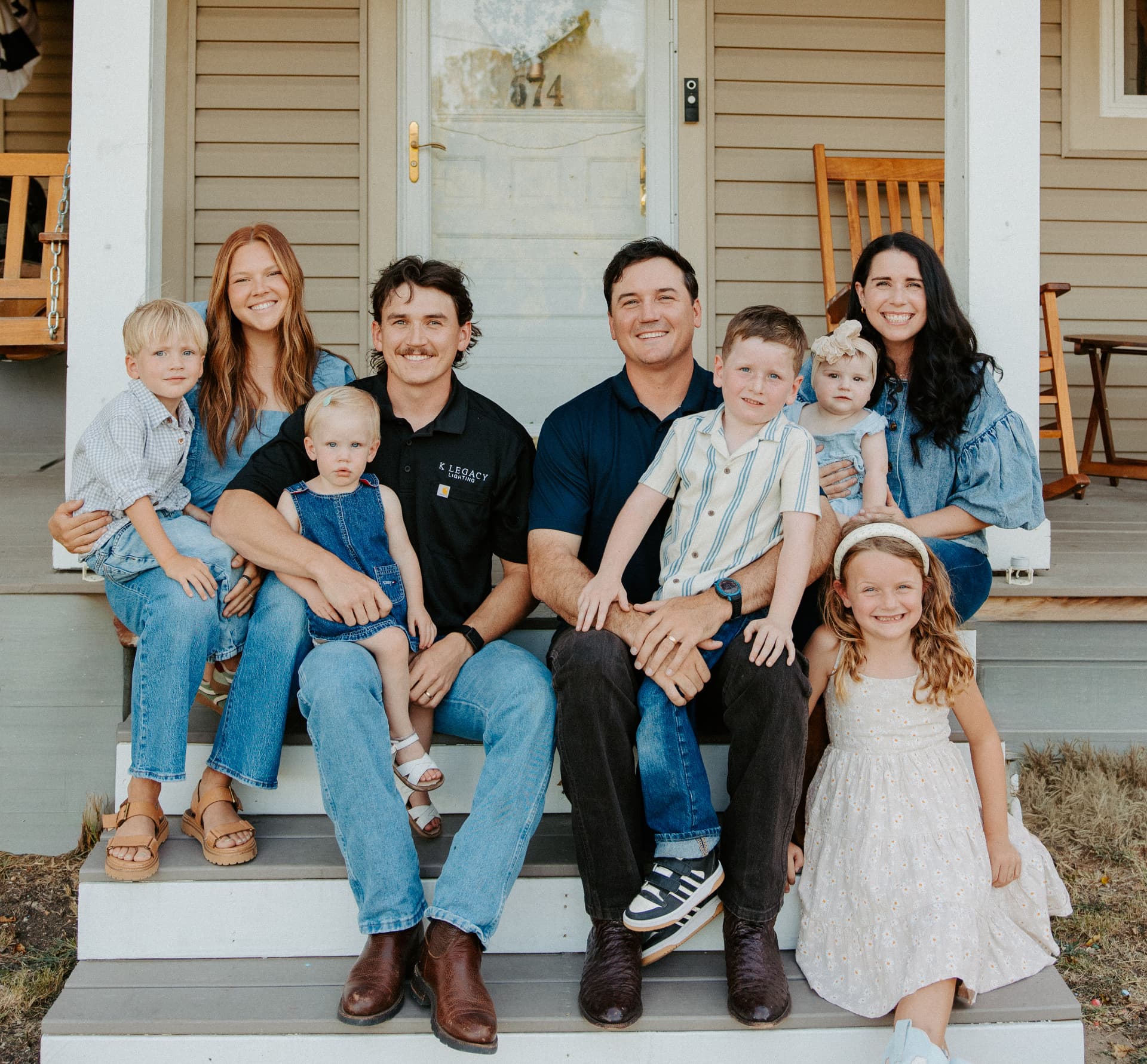 The Knowles family on the porch of their Van Alstyne, Texas home